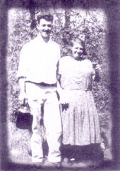 A family photo of Nonna "Rosa" Garré with her son in law Gino Molinaro holding the jug of family wine
